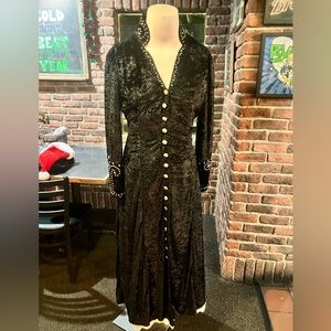 Fitted, floor-length crushed velvet and silver detail duster-dress.